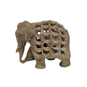 A vintage 1970s soapstone elephant carved sculpture