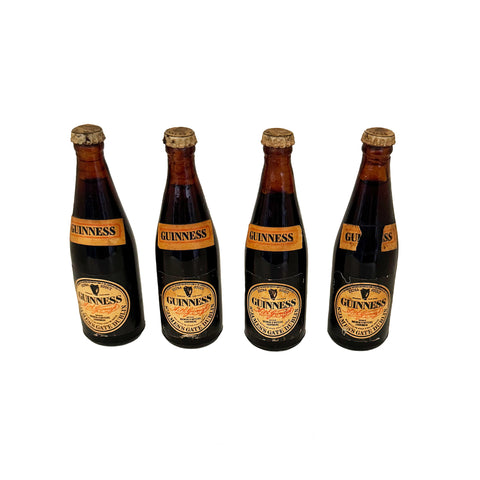 4 miniature glass Guinness bottles with labels