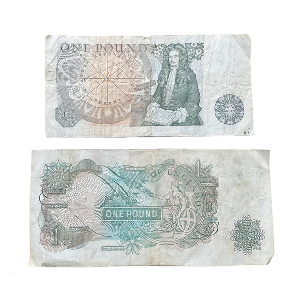 a set of 2 one pound notes showing the reverse Isaac newton