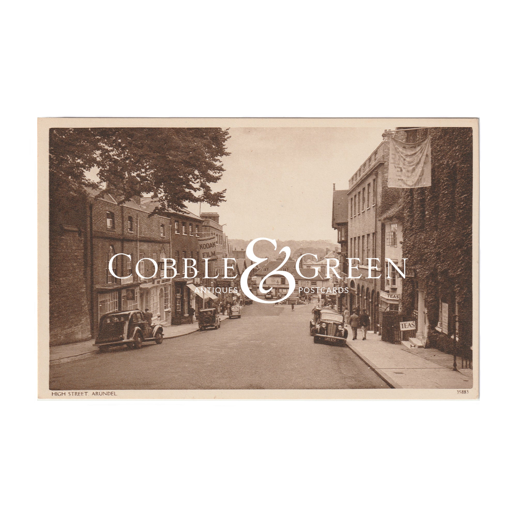 a sepia postcard of high street in arundel