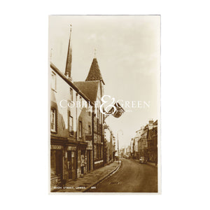 A real photographic postcard sepia finish of the High Street in Lewes East Sussex