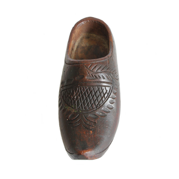 A wooden miniature shoe clog with heel dated circa 1900