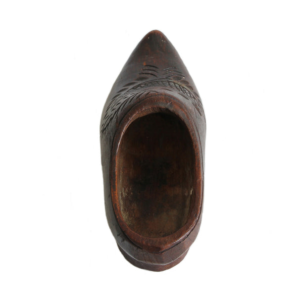 A preowned miniature wooden clog shoe with floral pattern and small heel