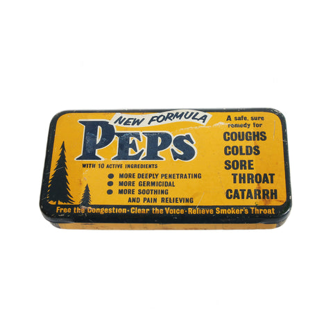 A vintage Peps mints advertising tin in orange and blue for colds 