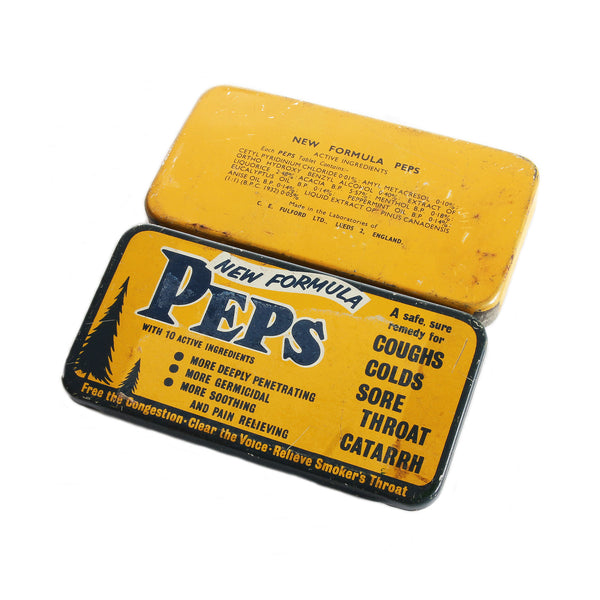 A vintage Peps mints advertising tin in orange and blue for colds and sore throats new formula medical chemist 