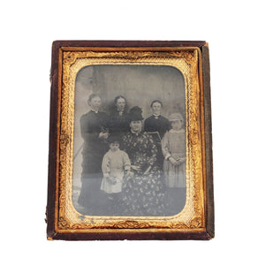 An antique tintype group photo of ladies in the 1800s gilt frame