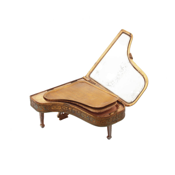 A collectable grand piano miniature powder compact with mirror