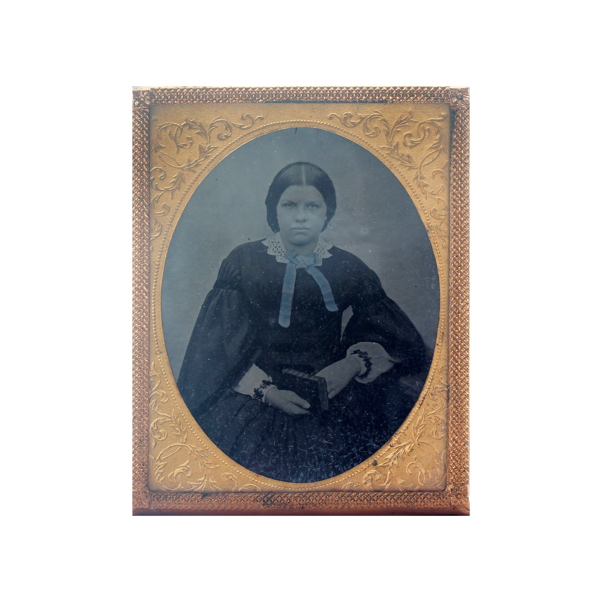 A beautiful antique ambrotype portrait of a young lady circa late 1800s