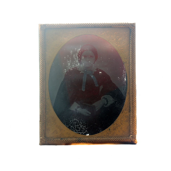 A secondhand antique portrait miniature of a young lady gilt frame and border