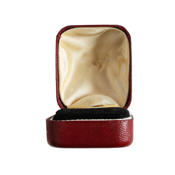 A plain small cushion shape red jewellery ring box with no name