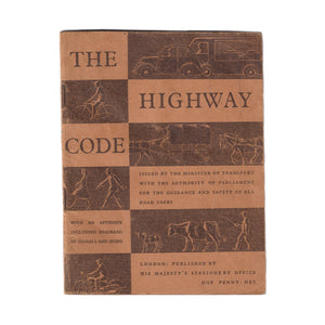 An old vintage 1940s Highway Code booklet in orange with illustrations and text