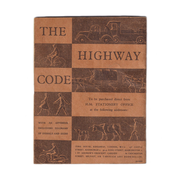 An orange little vintage booklet of highway code