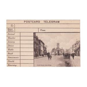 A postcard telegram of South Street in Worthing sepia blank on the back