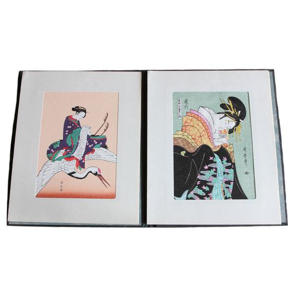 A beautiful set of secondhand japanese wood block prints in colour dated circa 1950s in a book