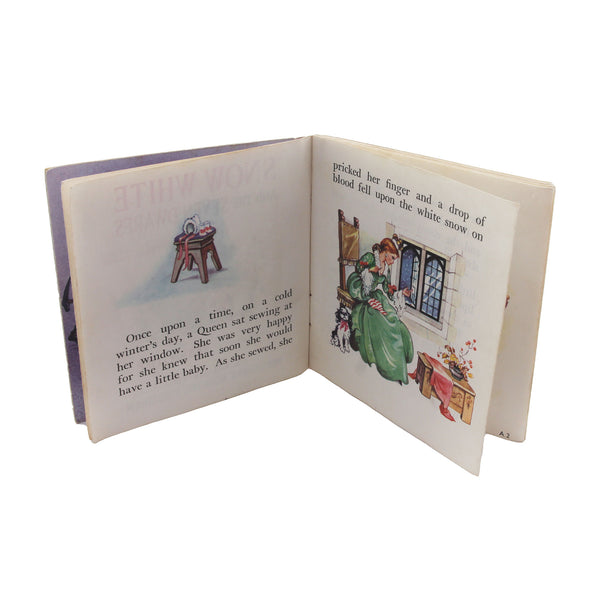 An illustrated book of Snow White & the 7 Dwarfs