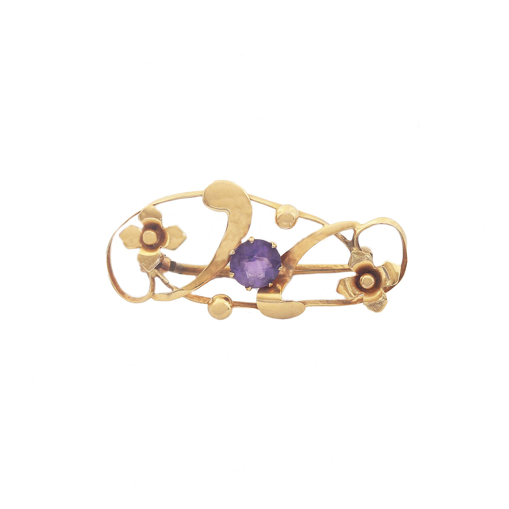 A beautiful antique amethyst floral yellow gold brooch circa early 1900s