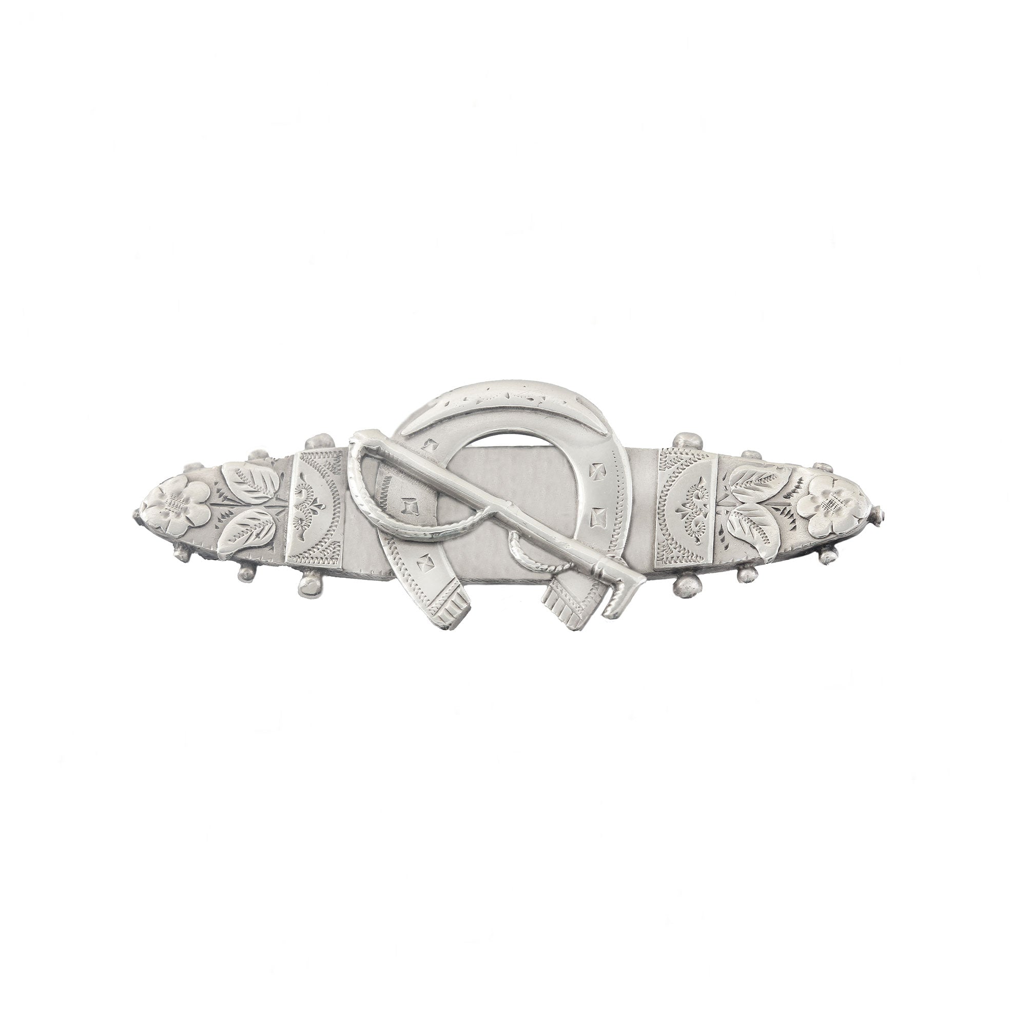 A horseshoe and flower design silver sweetheart brooch dated 1896