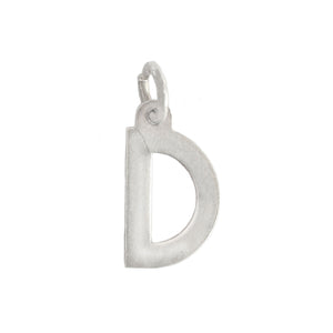 A secondhand sterling silver initial capital D charm with a scratch 