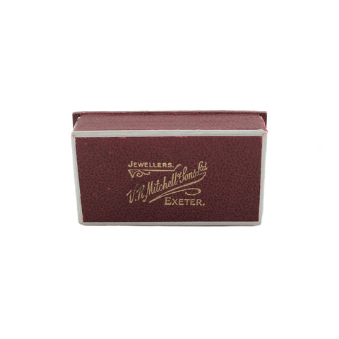 A dark red jewellers display box for rings or pendant VR Mitchell & Sons