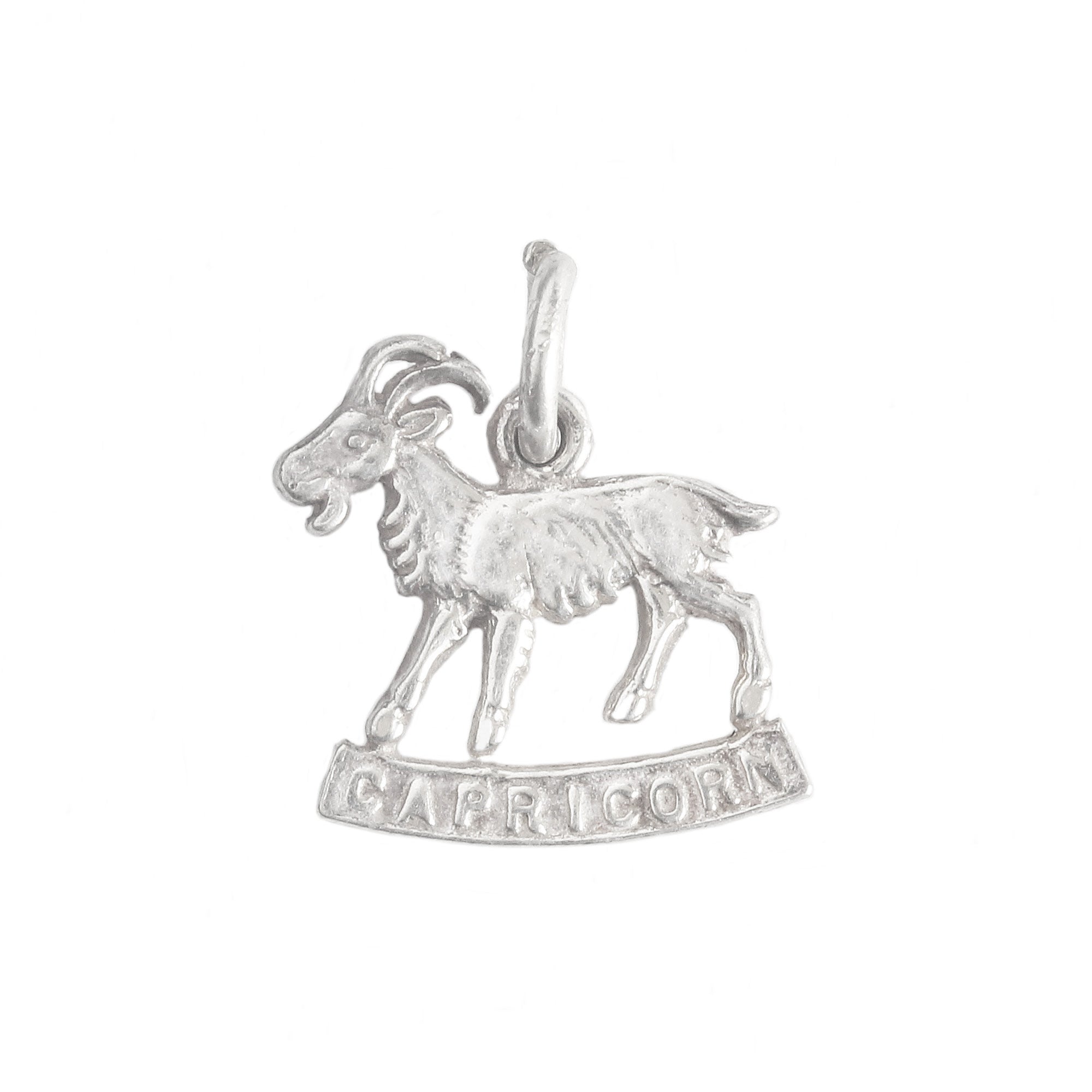 A vintage sterling silver Capricorn zodiac sign goat charm