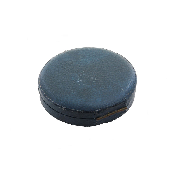 A wonderful blue leather round box with collar studs mother of pearl and brass fittings