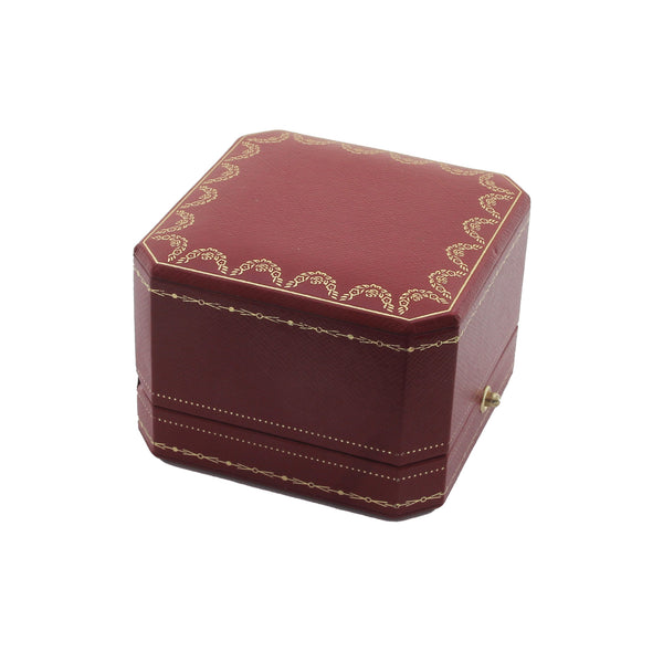 A beautiful square large ring display box by cartier with a fancy gilt border