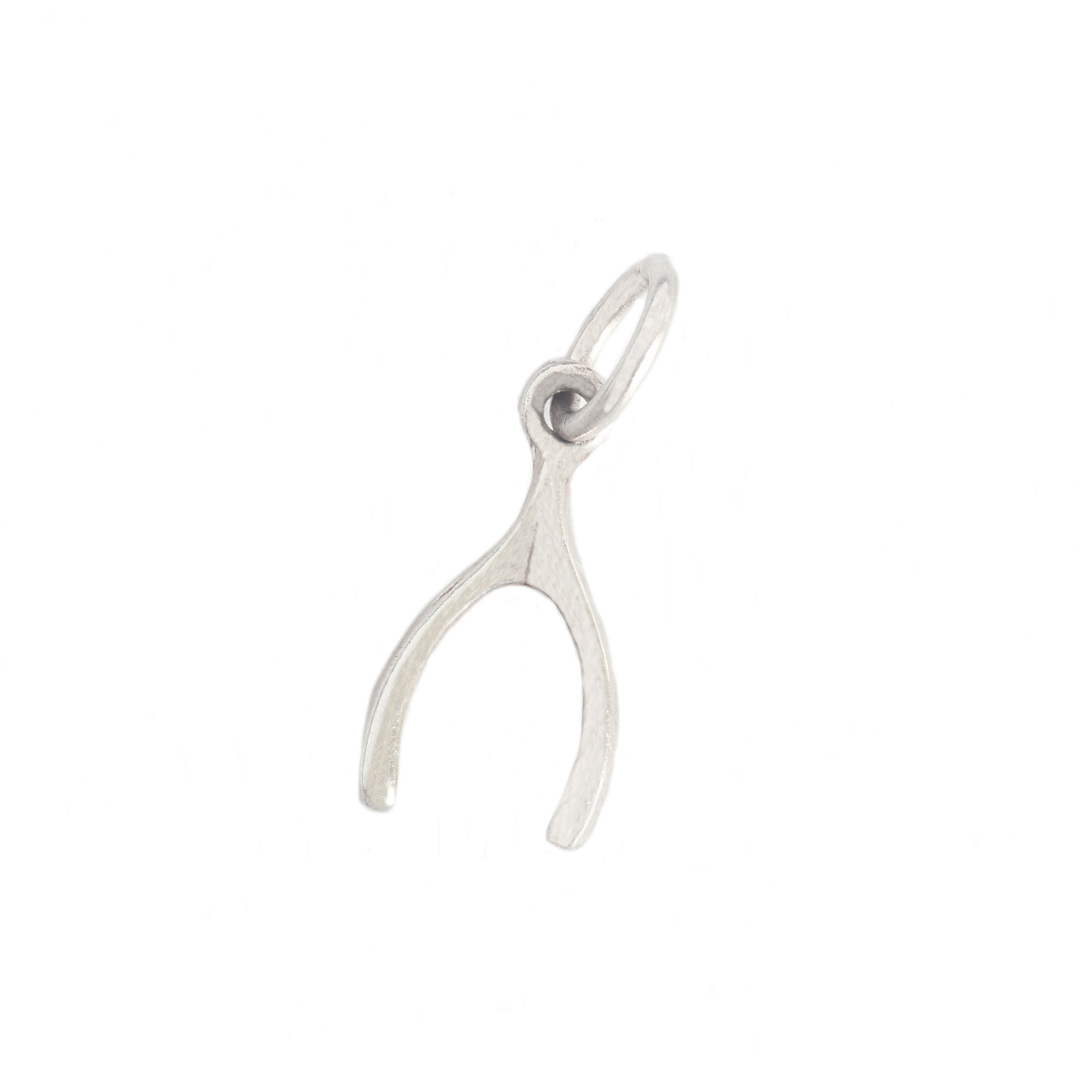 A vintage secondhand sterling silver small wishbone charm