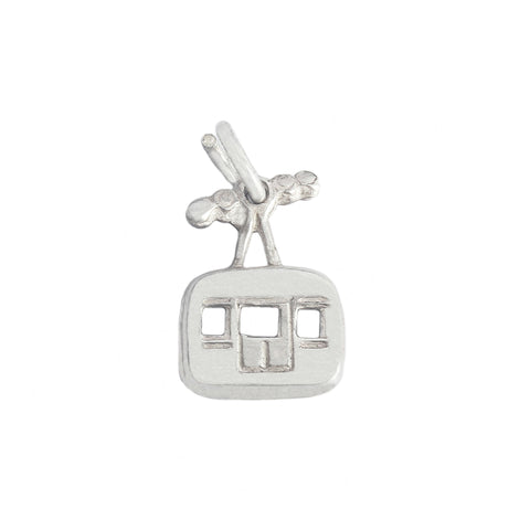 A vintage sterling silver cable car charm with cut out windows