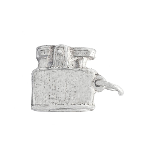 A vintage sterling silver solid cigarette lighter charm