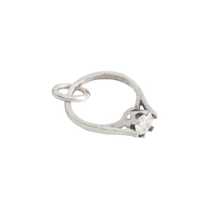 A silver engagement ring solitiare charm for a bracelet