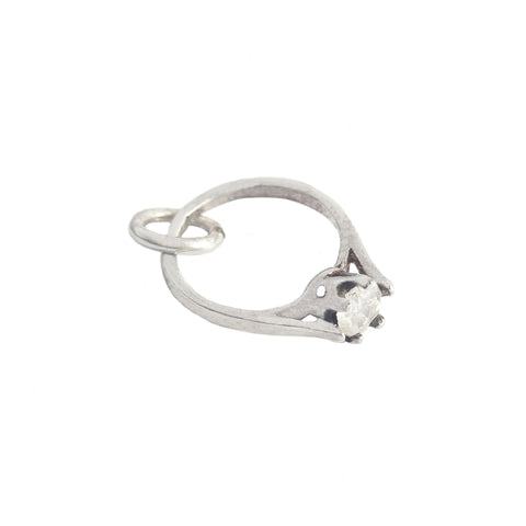 A silver engagement ring solitiare charm for a bracelet