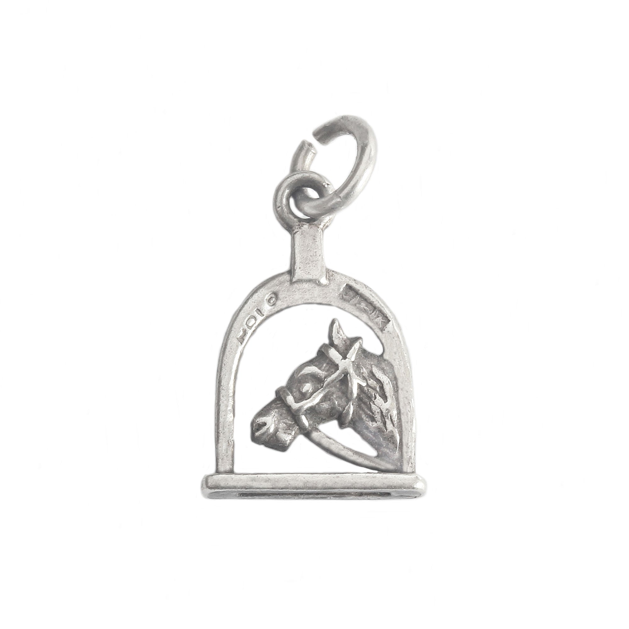 A vintage secondhand sterling silver horse and stirrup charm 1960s