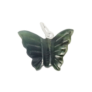 A beautiful green butterfly pendant with detailing on the wings