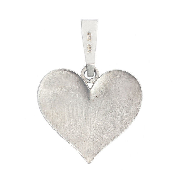 A secondhand silver floral design heart shaped pendant