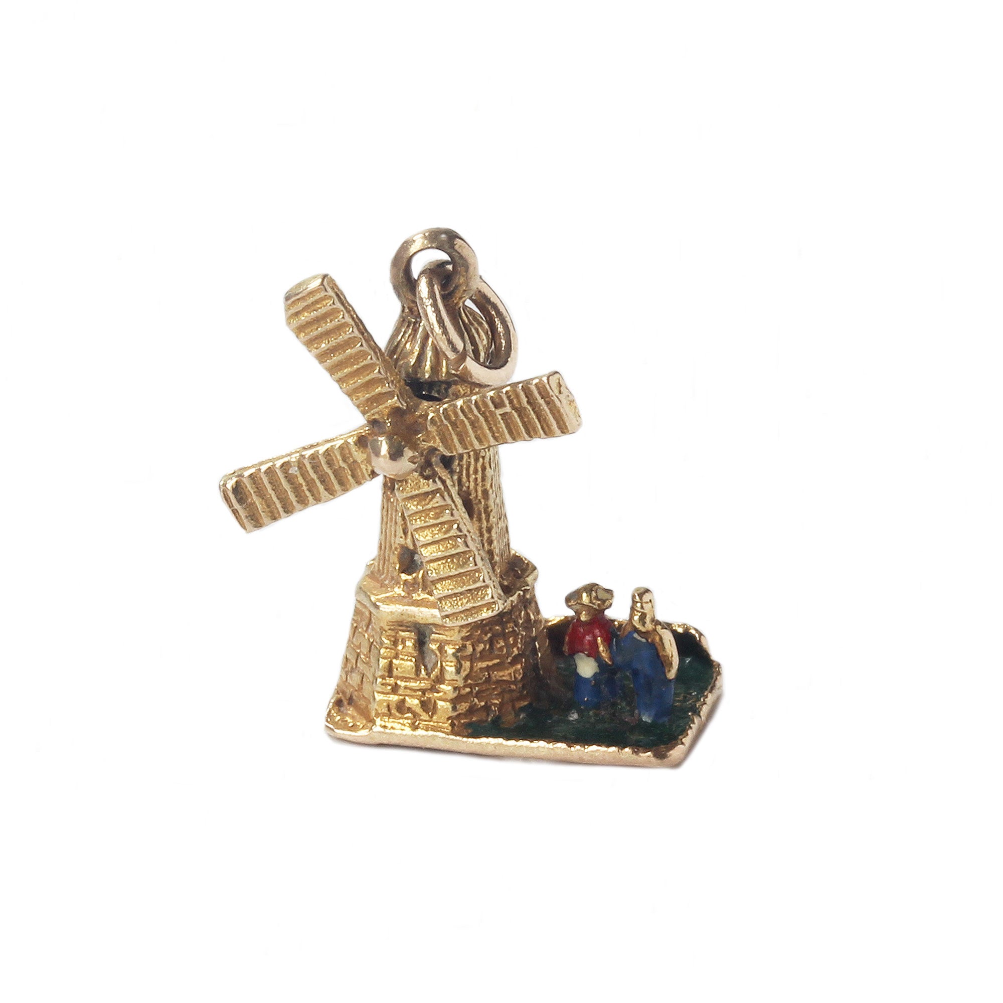 a yellow gold windmill charm with moving grooved sails and an enamel blue and red lady and man