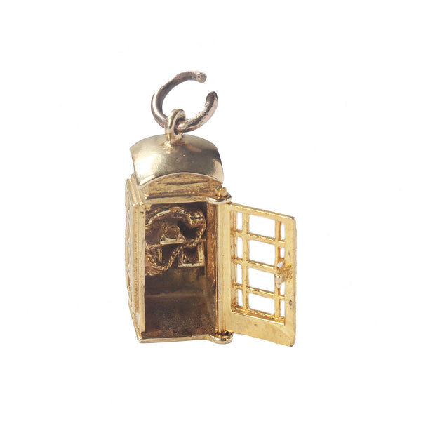 A fine quality old style telephone box charm in yellow gold