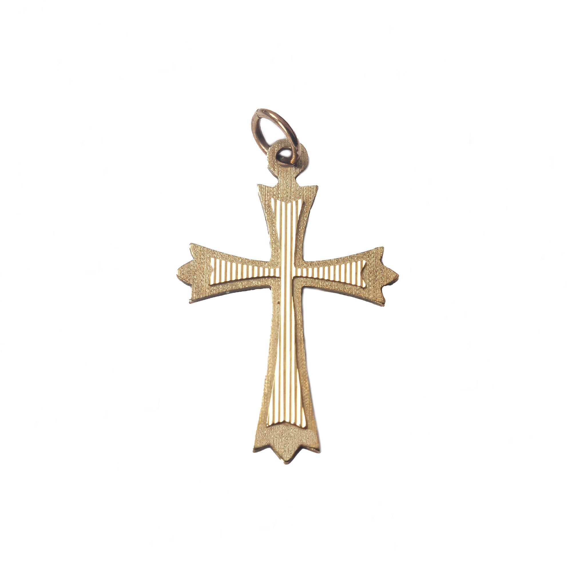 A vinage preowned patterned large cross pendant in yellow gold