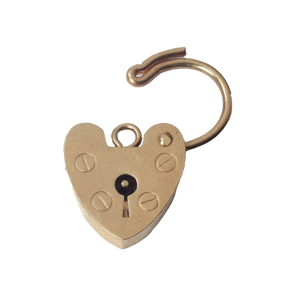 A yellow gold vintage padlock clasp with heart shape