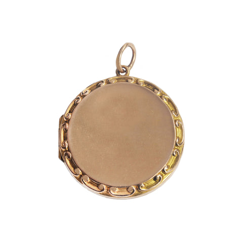 A beautiful antique victorian locket circular with pie crust edge