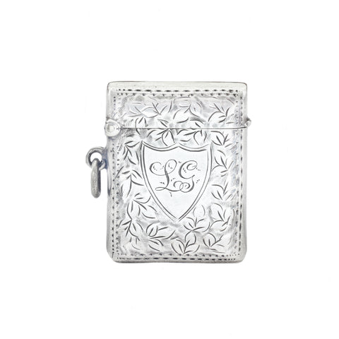 An antique vesta case with initials LG in a shield leaf flower pattern silver