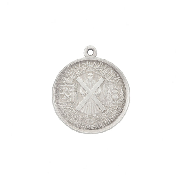 A Scottish amateur athletics association silver medal with engraving dated 1927