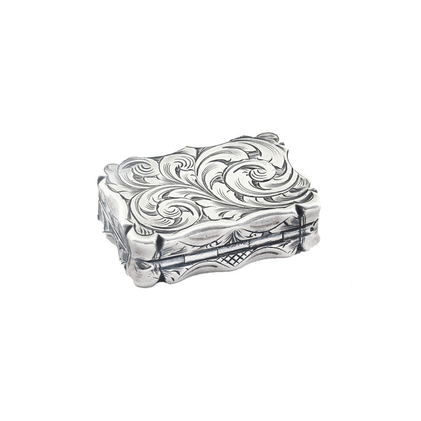 A superb rectangular rounded silver vinaigrette scoll pattern grill hallmarked 1854