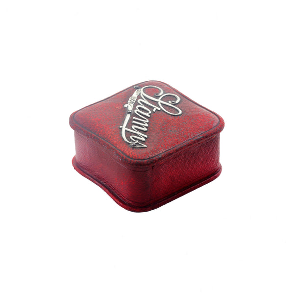 An Edwardian silver mount red leather stamp box with curved edges