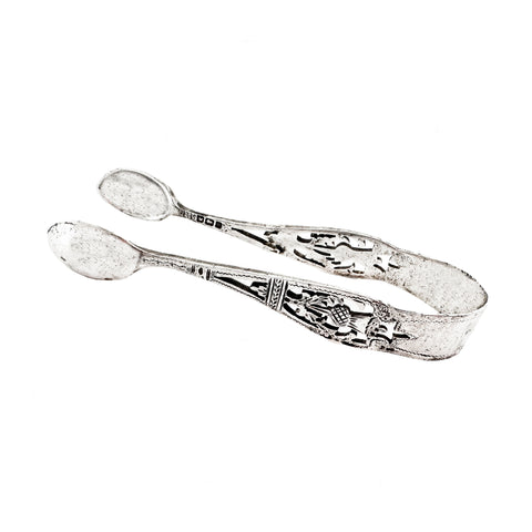 An antique pair of sugar tongs in sterling silver hallmarked 1913 thistle shaped