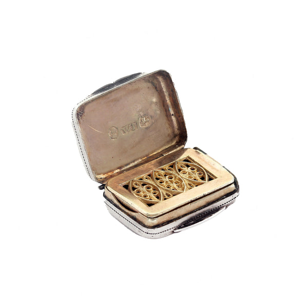 A georgian silver gilt vinaigrette small with grill and hallmarked 1815