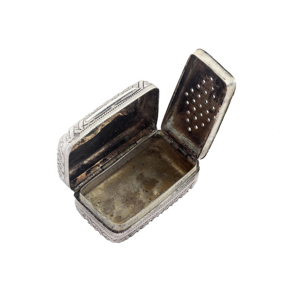 An early 1800s silver vinaigrette with grill and hallmark