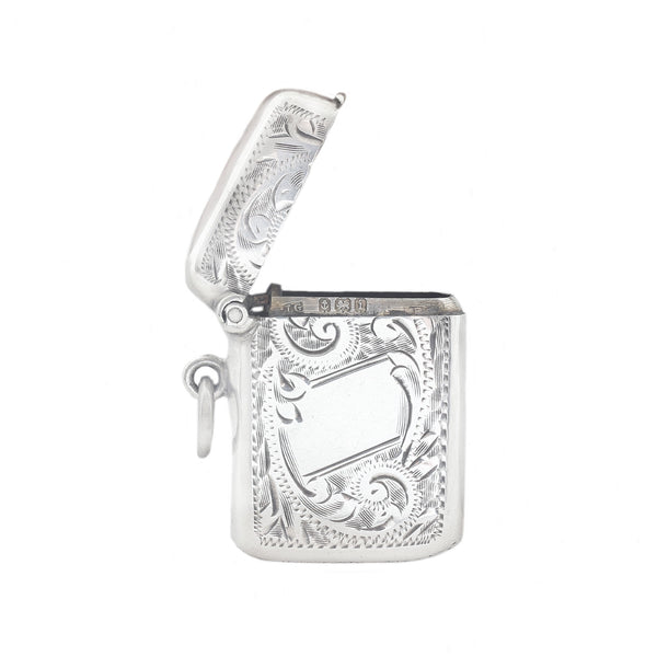 An antique vesta case in silver with pattern leaves space for engraving