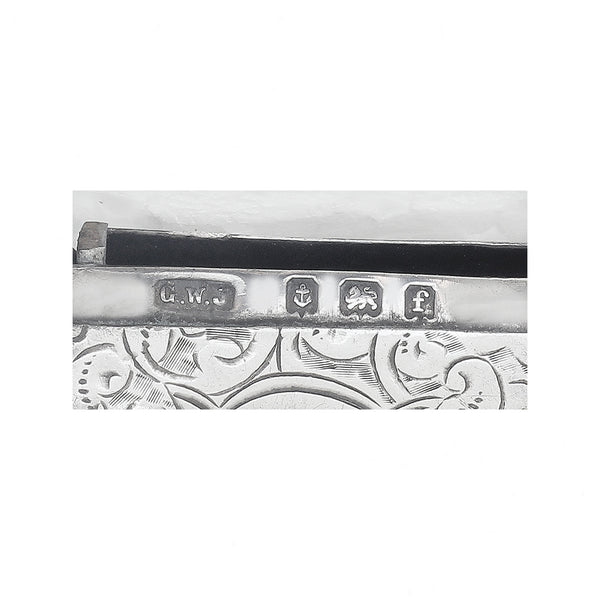 A silver vesta case hallmarked scroll pattern silver