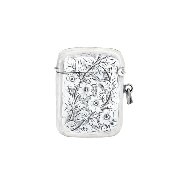 A beautiful vesta case in silver with floral pattern and hallmarked 1898